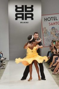 BERLIN, GERMANY - JULY 04:  Dancers perform ahead the runway at the Riani Fashion Show Spring/Summer 2018 at Umspannwerk Kreuzberg on July 4, 2017 in Berlin, Germany.  (Photo by Zacharie Scheurer/Getty Images for Riani) *** Local Caption *** Motsi Mabuse